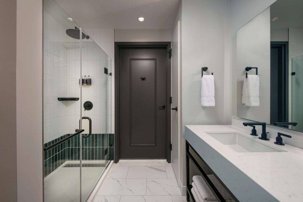 image-Capitol-Hill-Suite-City-View-King-and-Sofabed-Mobility-Roll-In-Shower-1